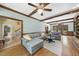 Spacious living room with access to the backyard and staircase to upper level at 821 Ascot Ln, Raleigh, NC 27615