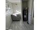 Bright bathroom featuring vanity with a marble countertop and a space for water heater at 8505 Ray Rd, Raleigh, NC 27613