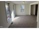 Spacious bedroom featuring new carpet, freshly painted walls, and lots of natural light at 8505 Ray Rd, Raleigh, NC 27613