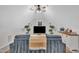 Bright and spacious bonus room featuring vaulted ceilings, and ample space for living area with a TV and sofa at 8801 Valley Hill Ct, Apex, NC 27539