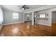 Spacious living room with hardwood floors open to kitchen and dining areas at 105 Hanna St, Carrboro, NC 27510