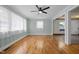 Cozy living room showcasing hardwood floors and natural lighting and flowing into other living areas at 105 Hanna St, Carrboro, NC 27510