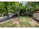 View of the large, treed backyard of the home at 110 Starlite Dr, Carrboro, NC 27510