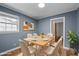 Inviting dining room with stylish furnishings and plenty of natural light at 110 Starlite Dr, Carrboro, NC 27510