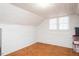 Cozy room with white walls, wood floors and ceiling, and a window for natural light at 1146 W Holt St, Mebane, NC 27302