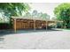 Large carport area provides an outdoor workspace and parking at 1146 W Holt St, Mebane, NC 27302