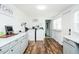 Functional laundry room with storage and ample counter space at 1146 W Holt St, Mebane, NC 27302