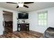 Comfortable living room with laminate wood floors, perfect for relaxing at 1146 W Holt St, Mebane, NC 27302