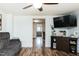 Spacious living room featuring laminate floors and plenty of space at 1146 W Holt St, Mebane, NC 27302