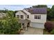 Charming two-story home with a covered porch, solar panels, and a well-maintained yard at 119 Tadworth Ct, Mebane, NC 27302