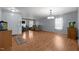 Versatile living area with hardwood floors, neutral walls, and plenty of space for multiple seating arrangements at 119 Tadworth Ct, Mebane, NC 27302