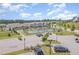 Aerial view of the community, showcasing amenities like the playground and tennis courts at 1428 Wrenn Rd, Durham, NC 27703
