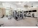 Well-equipped fitness center with modern exercise machines and large windows for a bright workout environment at 1428 Wrenn Rd, Durham, NC 27703
