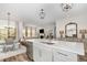 Stylish open kitchen with an island, stainless steel appliances, and seamless flow to living spaces at 1428 Wrenn Rd, Durham, NC 27703