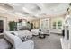 Inviting lounge area with comfortable seating, elegant decor, and plenty of natural light for relaxation at 1428 Wrenn Rd, Durham, NC 27703