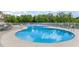 Beautiful community pool with plenty of lounge chairs for relaxing in the sun at 1428 Wrenn Rd, Durham, NC 27703