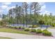 Pickleball court surrounded by landscaping, offering recreational opportunities at 1428 Wrenn Rd, Durham, NC 27703
