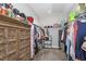 Well-organized walk-in closet providing ample storage space for clothing and accessories at 1428 Wrenn Rd, Durham, NC 27703