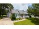 Charming home featuring a well-manicured lawn, dormer windows, and a welcoming entrance at 2016 Cypress Ct, Clayton, NC 27520