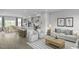 Open floor plan with living room flowing into the kitchen and dining area at 2355 Stephens Pass Sta, Apex, NC 27502