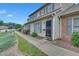 A charming townhouse featuring a well-maintained lawn and inviting front entrance at 2602 Hitchcock Dr, Durham, NC 27705