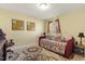 Comfortable bedroom showcases a daybed, decorative rug, and ample lighting at 267 Dando St, Garner, NC 27529