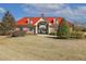Community clubhouse with a red roof, inviting entrance, and well-manicured landscaping at 267 Dando St, Garner, NC 27529