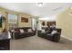 Spacious living room featuring comfortable sofas and seamless access to the kitchen at 267 Dando St, Garner, NC 27529