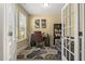 Bright home office with neutral walls, natural light, and french doors at 267 Dando St, Garner, NC 27529