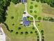 Gorgeous property featuring a winding driveway and extensive landscaping surrounding a beautiful single-Gathering home at 280 Phillips Rd, Selma, NC 27576
