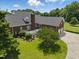 Lovely home with an attached garage, deck, and lush landscaping surrounding the property, creating a private oasis at 280 Phillips Rd, Selma, NC 27576