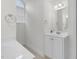 Well-lit bathroom showcasing a white vanity with a sink and a large mirror with modern fixtures at 280 Phillips Rd, Selma, NC 27576
