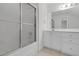 Clean bathroom with a glass shower door, a large mirror, and a spacious vanity at 280 Phillips Rd, Selma, NC 27576