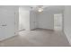 Spacious bedroom offering neutral carpet, a ceiling fan, and multiple closet options at 280 Phillips Rd, Selma, NC 27576