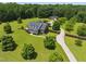 Beautiful home with well-manicured lawn and mature trees offering curb appeal and a welcoming entrance at 280 Phillips Rd, Selma, NC 27576