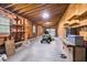 Spacious garage with exposed beams, windows, and ample storage space at 280 Phillips Rd, Selma, NC 27576
