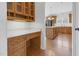Kitchen featuring white countertops, wooden cabinets, and stainless steel appliances at 280 Phillips Rd, Selma, NC 27576