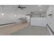 Open concept living room with modern fixtures and light, neutral finishes throughout at 280 Phillips Rd, Selma, NC 27576