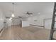 Open concept living room with modern fixtures and light, neutral finishes throughout at 280 Phillips Rd, Selma, NC 27576