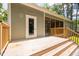 Wooden deck of house overlooking green backyard at 293 Carolina Oaks Ave, Smithfield, NC 27577