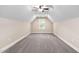 Charming bedroom featuring neutral walls, plush carpet, and natural light at 293 Carolina Oaks Ave, Smithfield, NC 27577