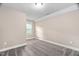 Bedroom with neutral color and window at 293 Carolina Oaks Ave, Smithfield, NC 27577