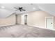 Spacious bedroom features plush carpet, neutral walls, and a ceiling fan at 293 Carolina Oaks Ave, Smithfield, NC 27577