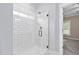 Modern shower with glass door and white subway tile at 293 Carolina Oaks Ave, Smithfield, NC 27577