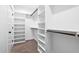 Spacious walk-in closet with built-in shelving at 293 Carolina Oaks Ave, Smithfield, NC 27577