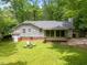 This home features a spacious backyard with a screened in porch perfect for outdoor entertaining at 3007 Appling Way, Durham, NC 27703