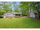 Backyard with storage shed and partial fence at 3007 Appling Way, Durham, NC 27703