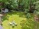 A large backyard with a shed offers ample outdoor space and storage at 3007 Appling Way, Durham, NC 27703