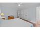 Bedroom with hardwood floors, large closets, ceiling fan and an attached bathroom for convenient and easy living at 3007 Appling Way, Durham, NC 27703