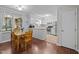 Bright kitchen and dining area, featuring white cabinets and stainless steel appliances at 3007 Appling Way, Durham, NC 27703